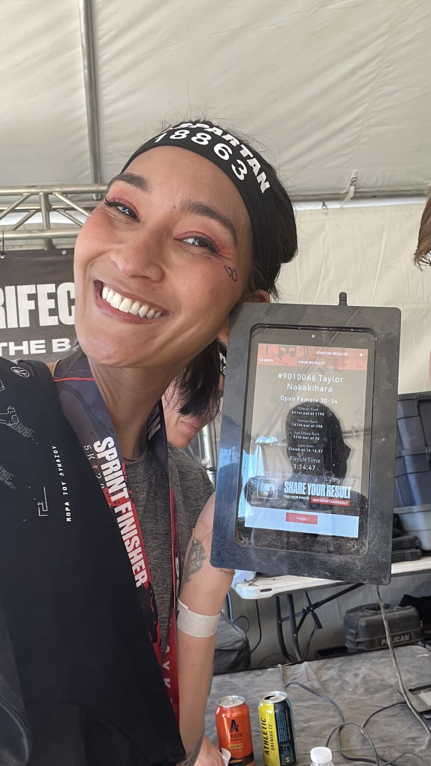 Taylor Nakakihara showing her finish time at the 2026 Arizona Spartan Race